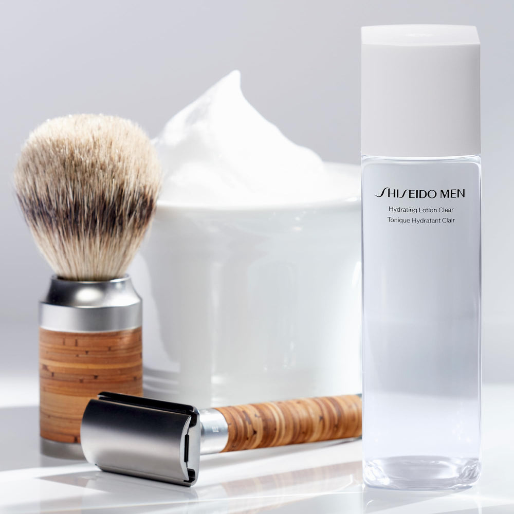 Shiseido Men hydrating lotion clear size comparison in hand demonstrating travel-friendly 5 oz benefit