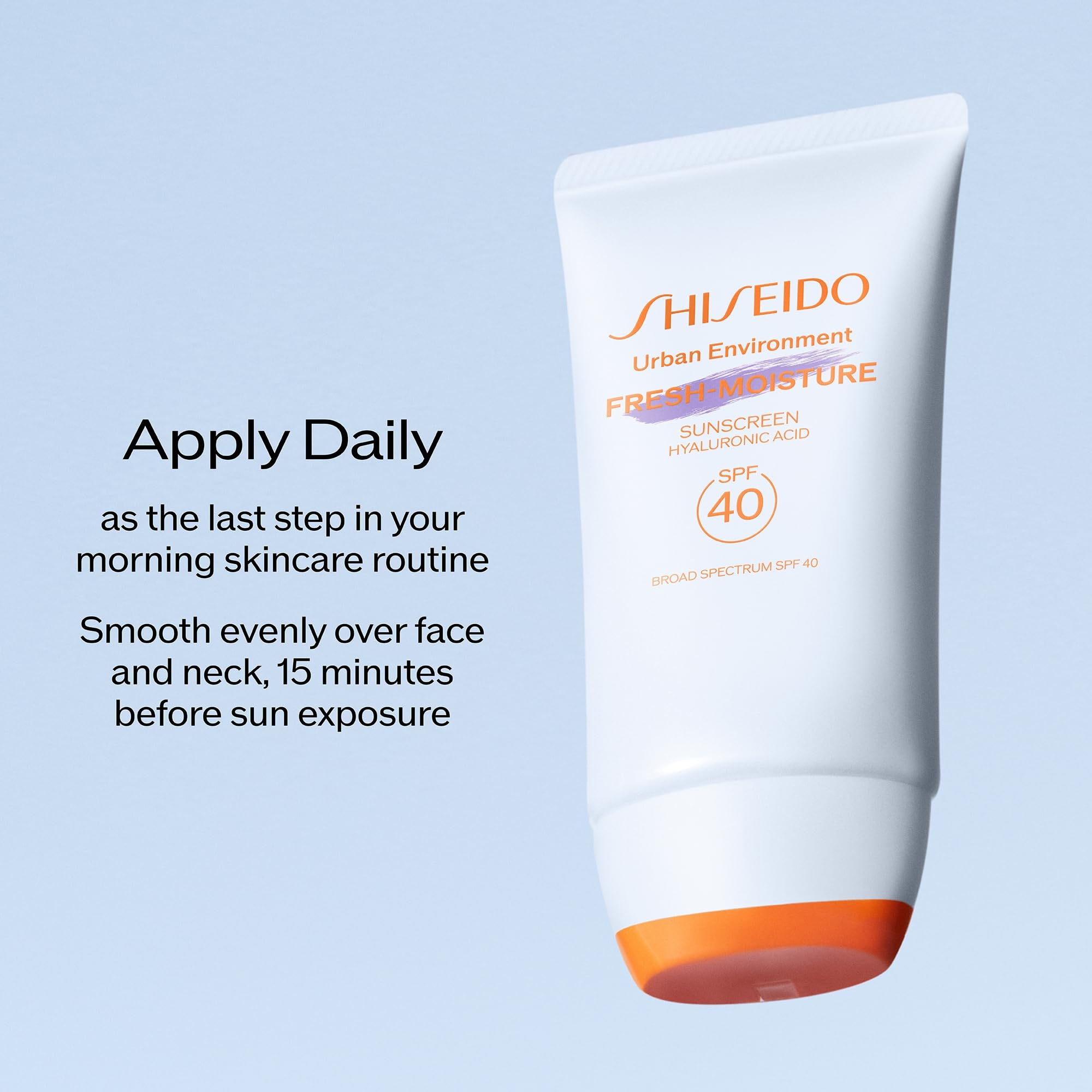 Shiseido 50 mL tube next to common items to indicate compact travel size