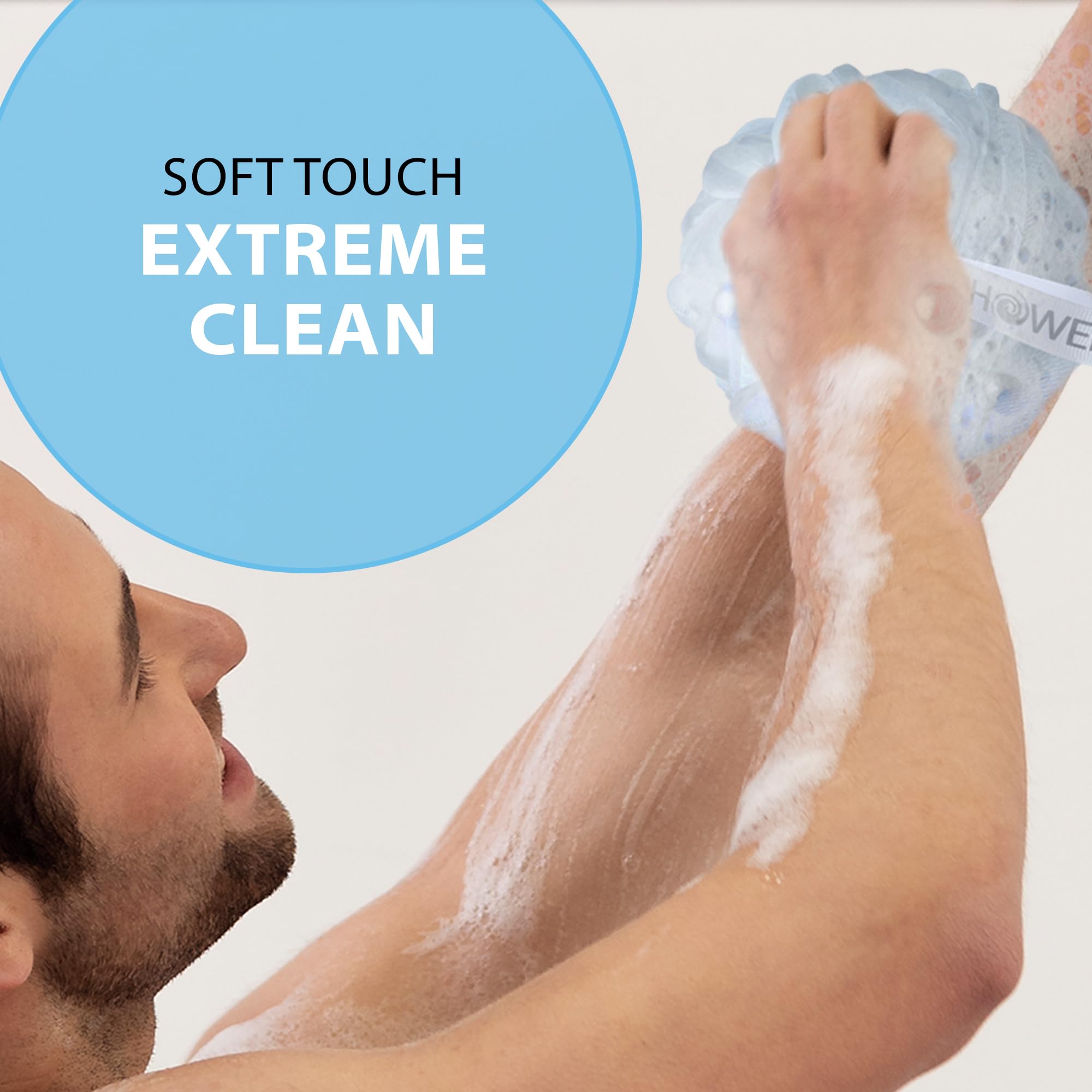 SHOWER BOUQUET loofah held in hand to show extra-large size and coverage
