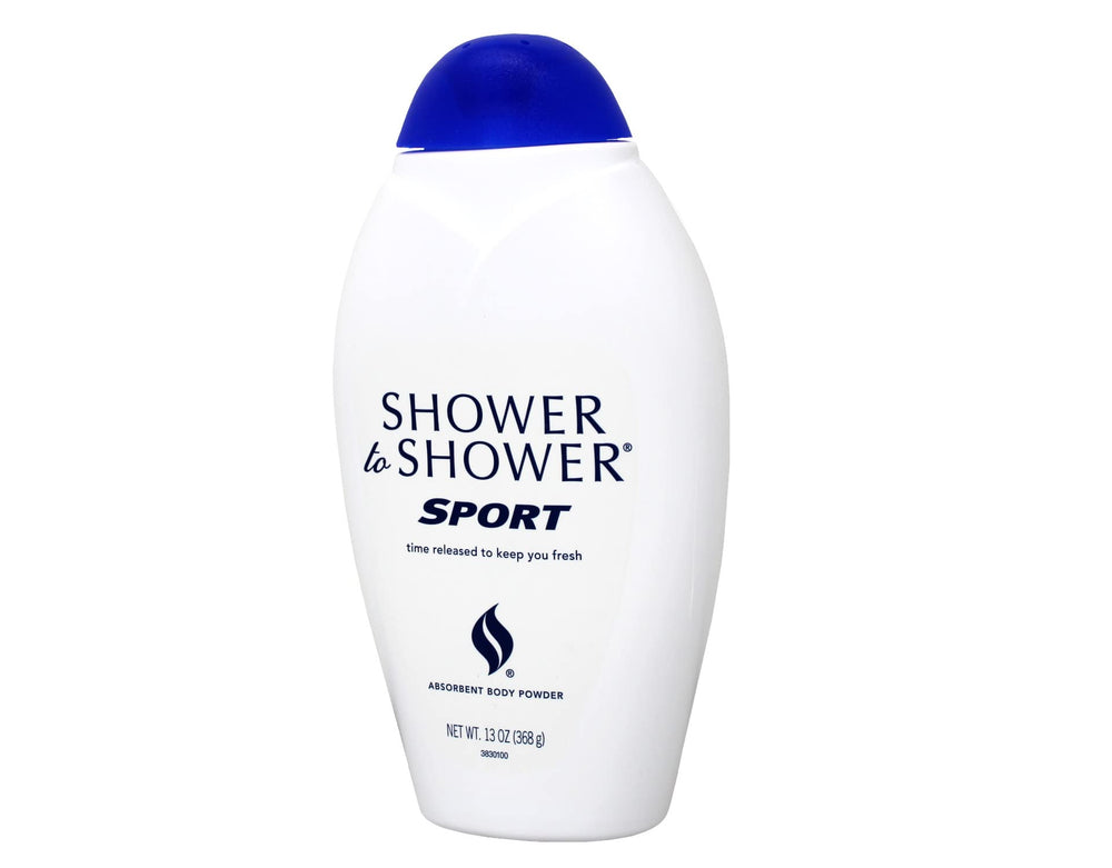 Shower To Shower bottle in hand for scale highlighting 13-ounce size and value in a four-pack