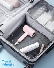 SHRATE hair dryer in travel setting demonstrating portability and low-noise benefit
