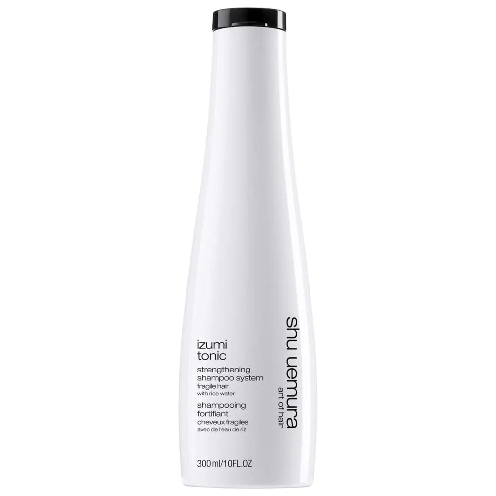 shu uemura art of hair bottle front view showing premium packaging and benefits