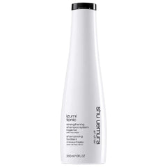 shu uemura art of hair bottle front view showing premium packaging and benefits