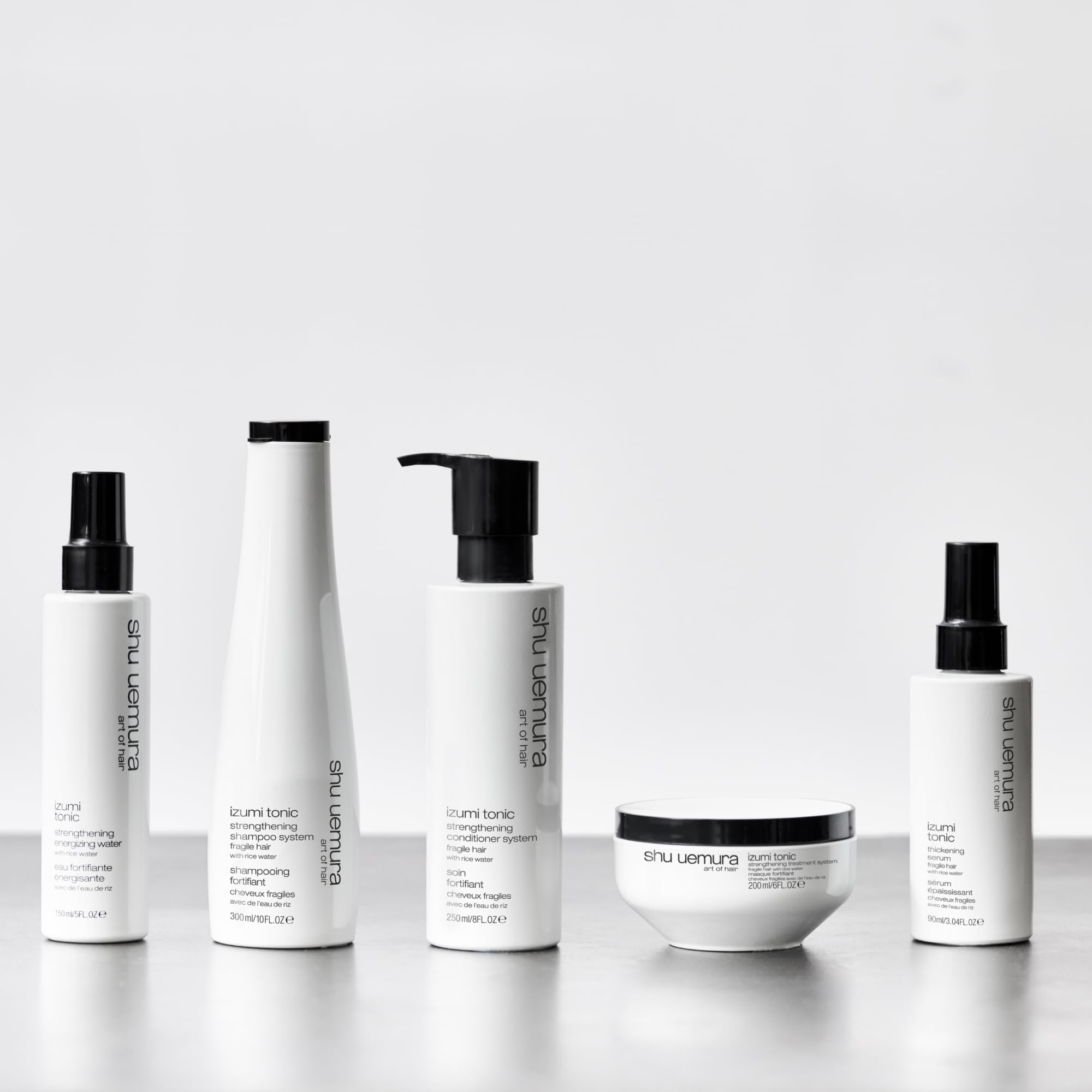 shu uemura art of hair displayed in bathroom lifestyle scene suggesting daily use