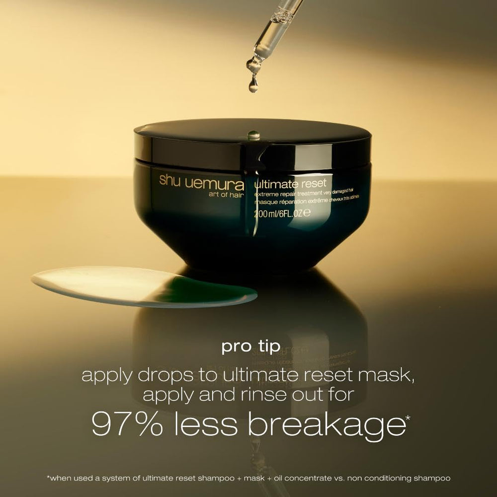 shu uemura art of hair next to a ruler indicating 1.7 fl oz size and travel-friendly scale