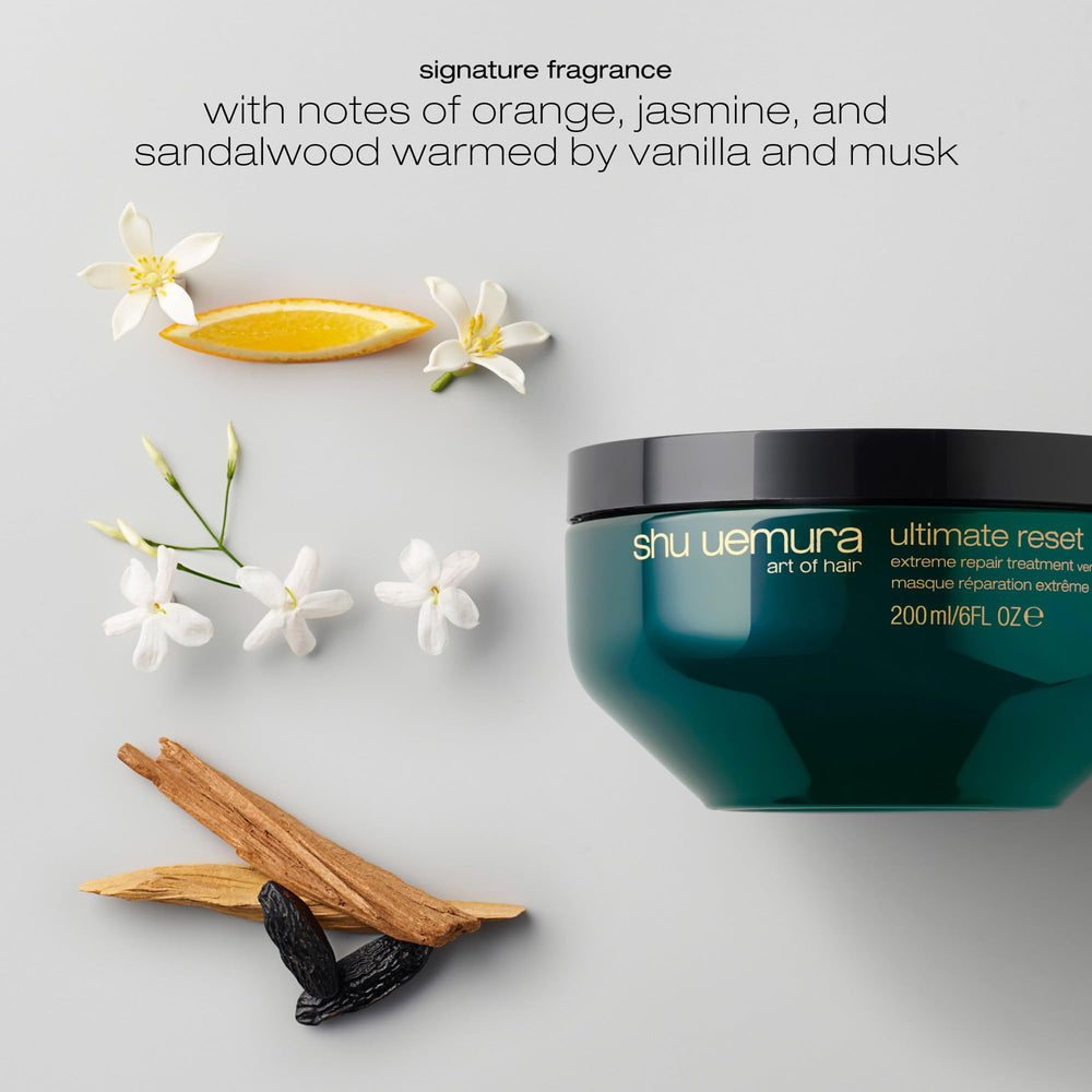 shu uemura art of hair 6 fl oz tub in hand for scale, conveys accurate product size
