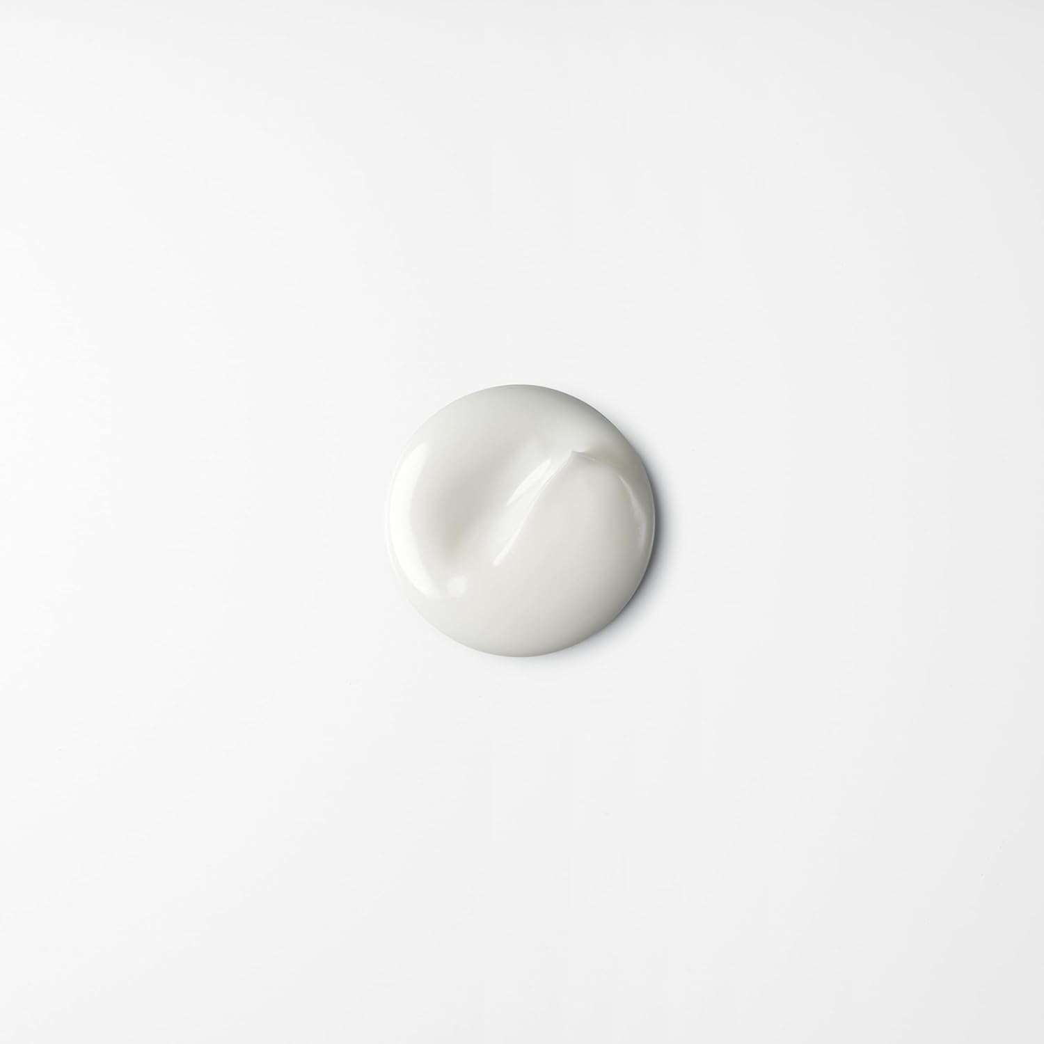 shu uemura jar with size and contents label informing customers about 2.54 fl oz product