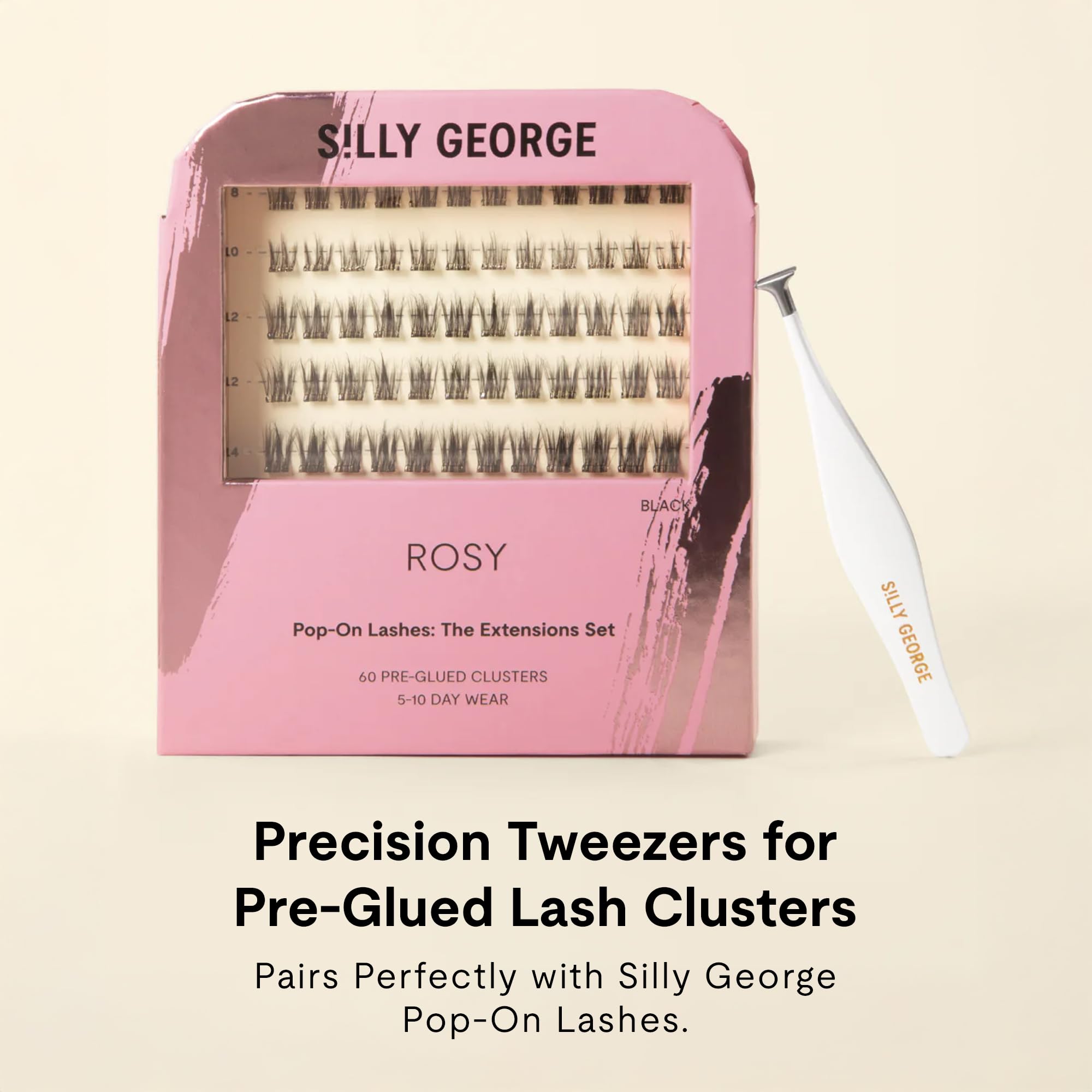 Silly George tweezer held during application demonstrating easier placement