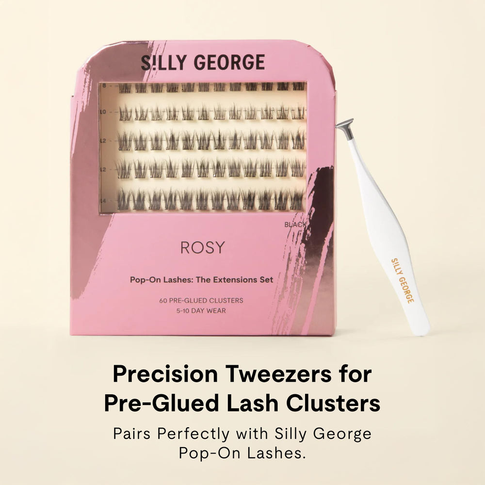 Silly George tweezer held during application demonstrating easier placement