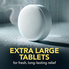 SinuCleanse tablet held in hand to show extra-large size and scale