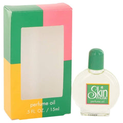 Skin Musk bottle in hand for size comparison and portability benefit