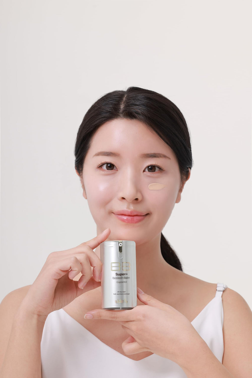 SKIN79 texture swipe of BB cream on skin, shows blendable coverage and smooth finish