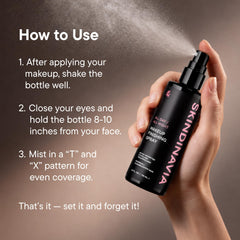 SKINDINAVIA in hand illustrating pocket-friendly 2 oz bottle for on-the-go touch-ups benefit
