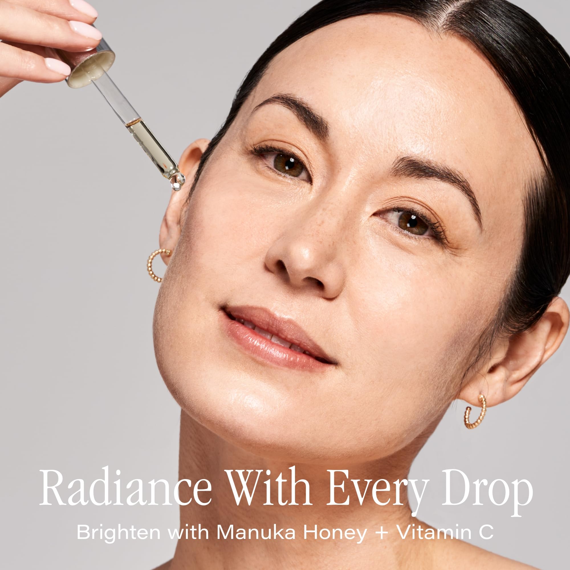 SKINN face oil dropper dispensing a single nourishing drop for hydration