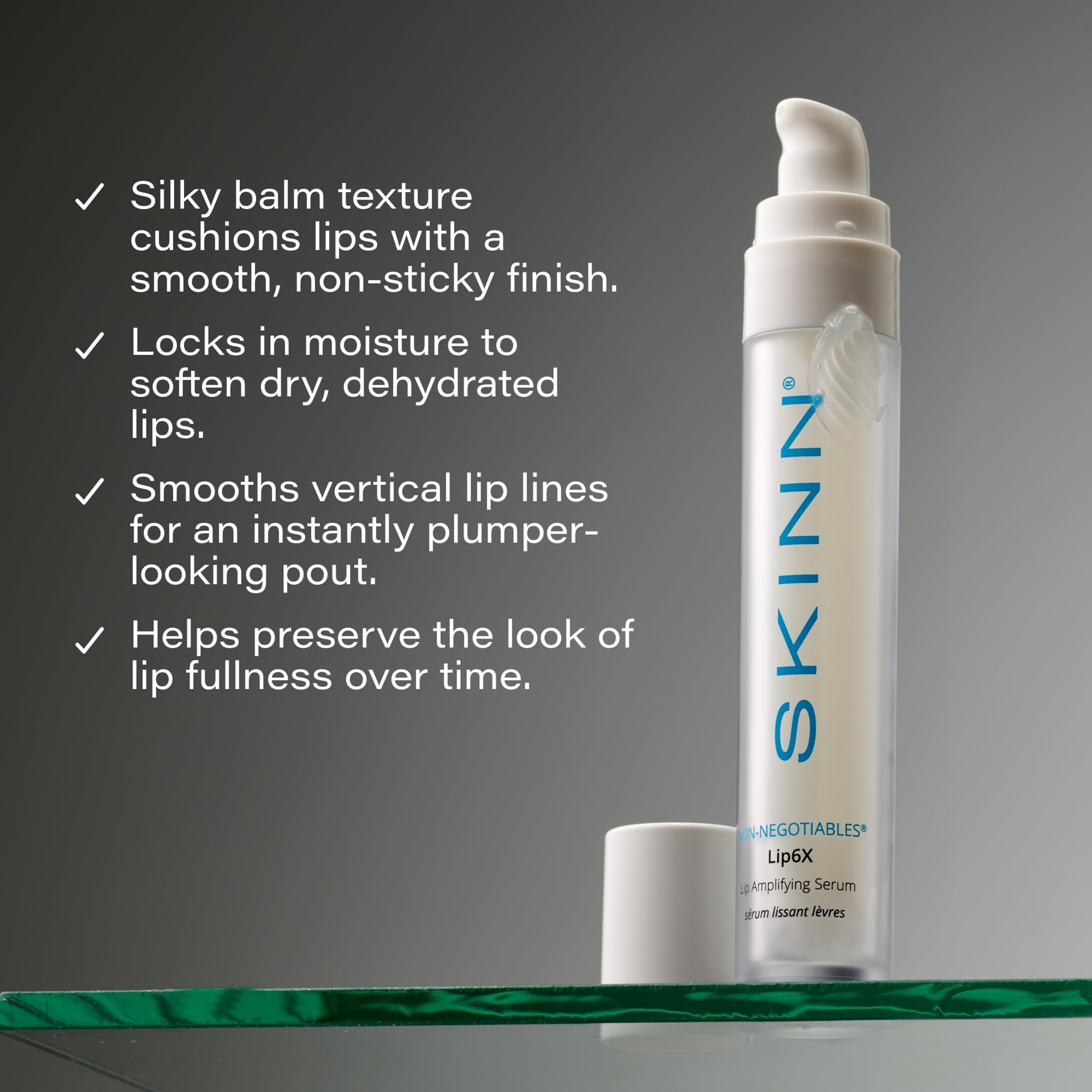 SKINN serum texture drop showing silky, non-sticky formula benefits
