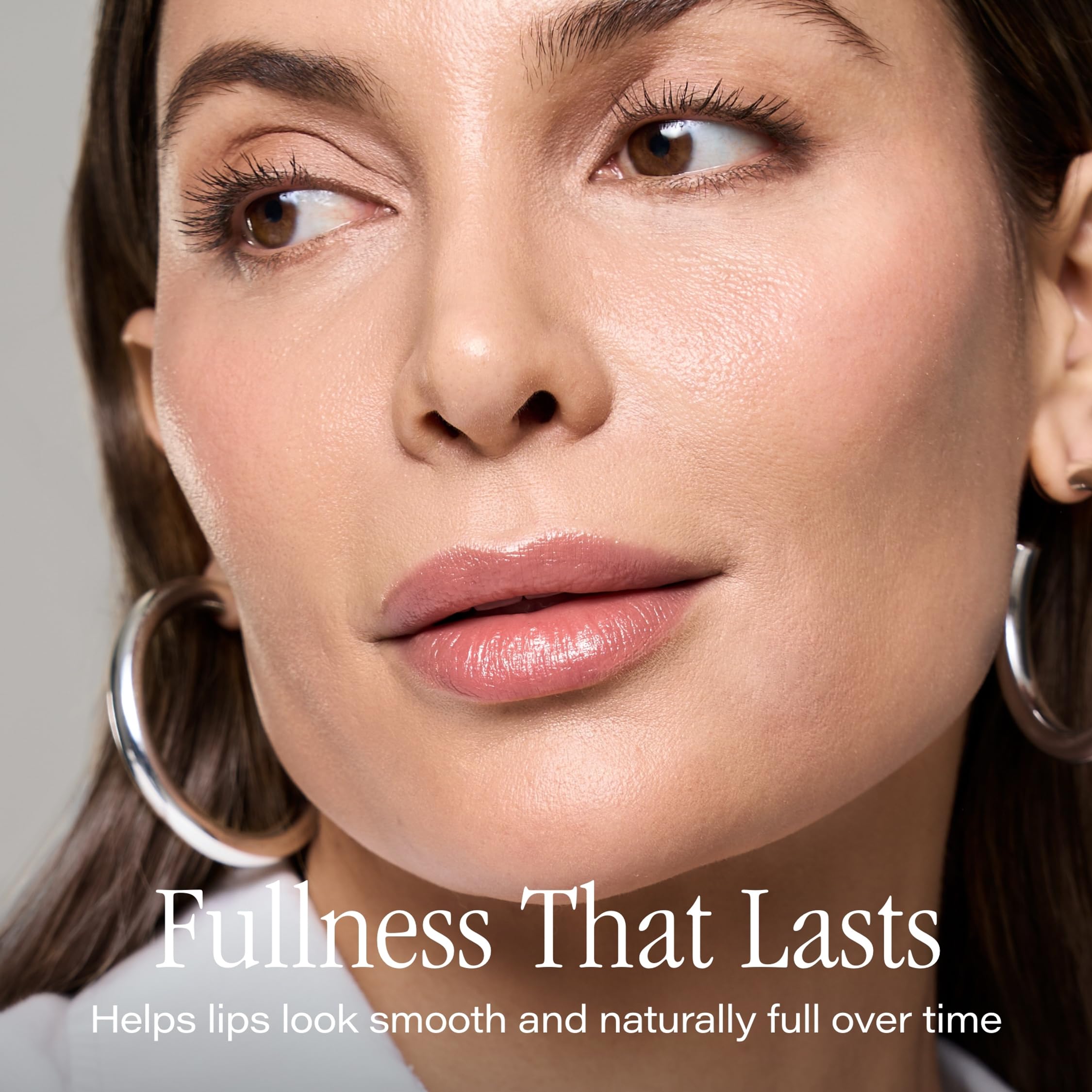 SKINN close-up of Lip6X tube and applicator highlighting easy precision