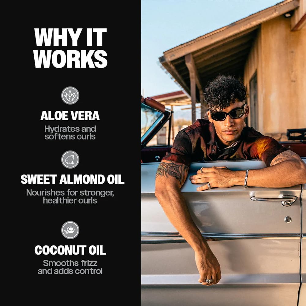 Slick Gorilla man applying cream to damp hair for defined curls and reduced frizz
