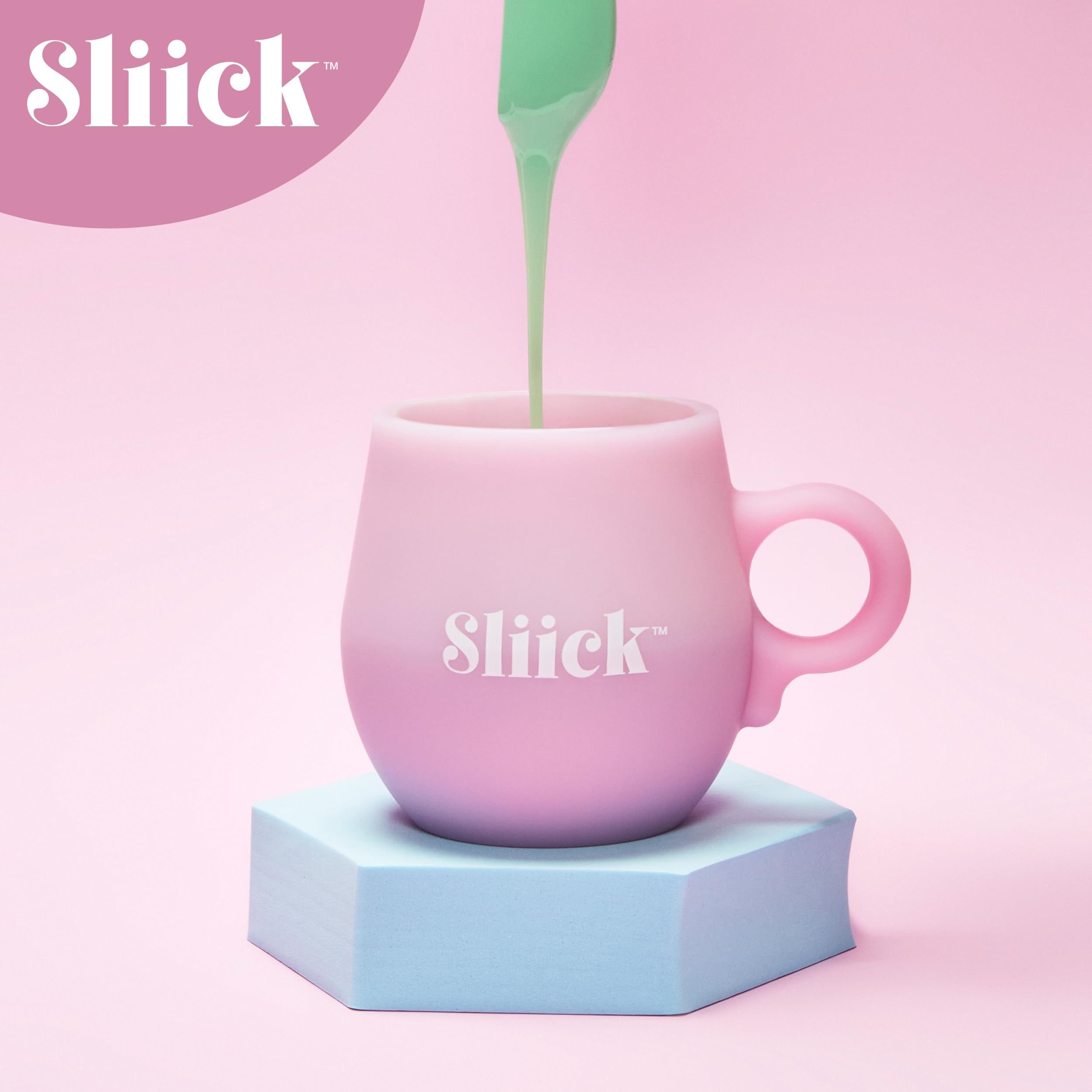 Sliick melting cup next to hand showing compact size for travel