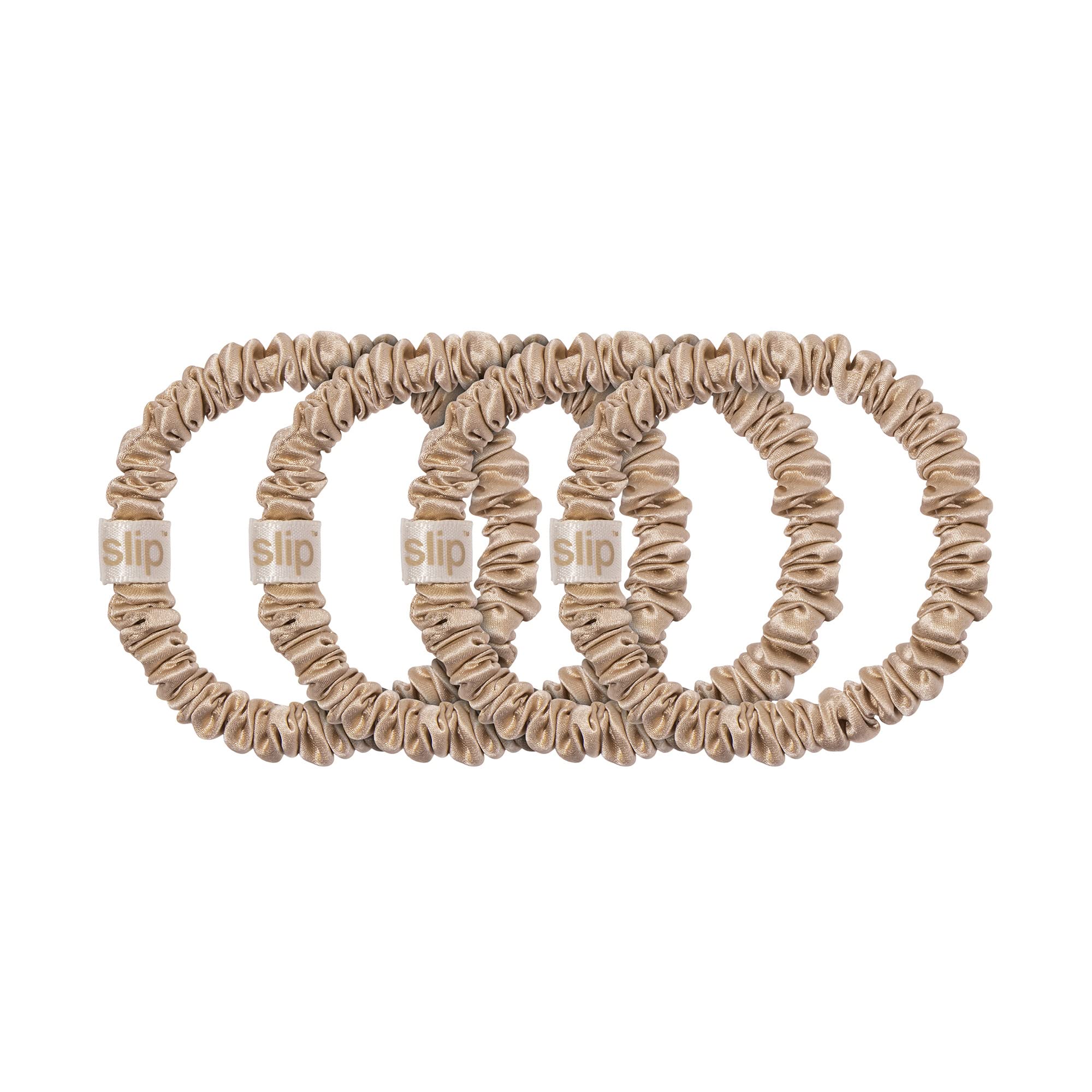 Detail of SLIP scrunchie holding a low bun, reduced creasing visible