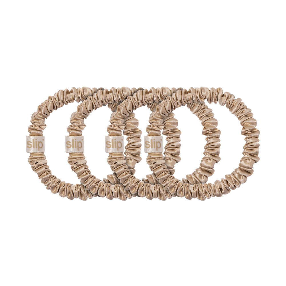 Detail of SLIP scrunchie holding a low bun, reduced creasing visible