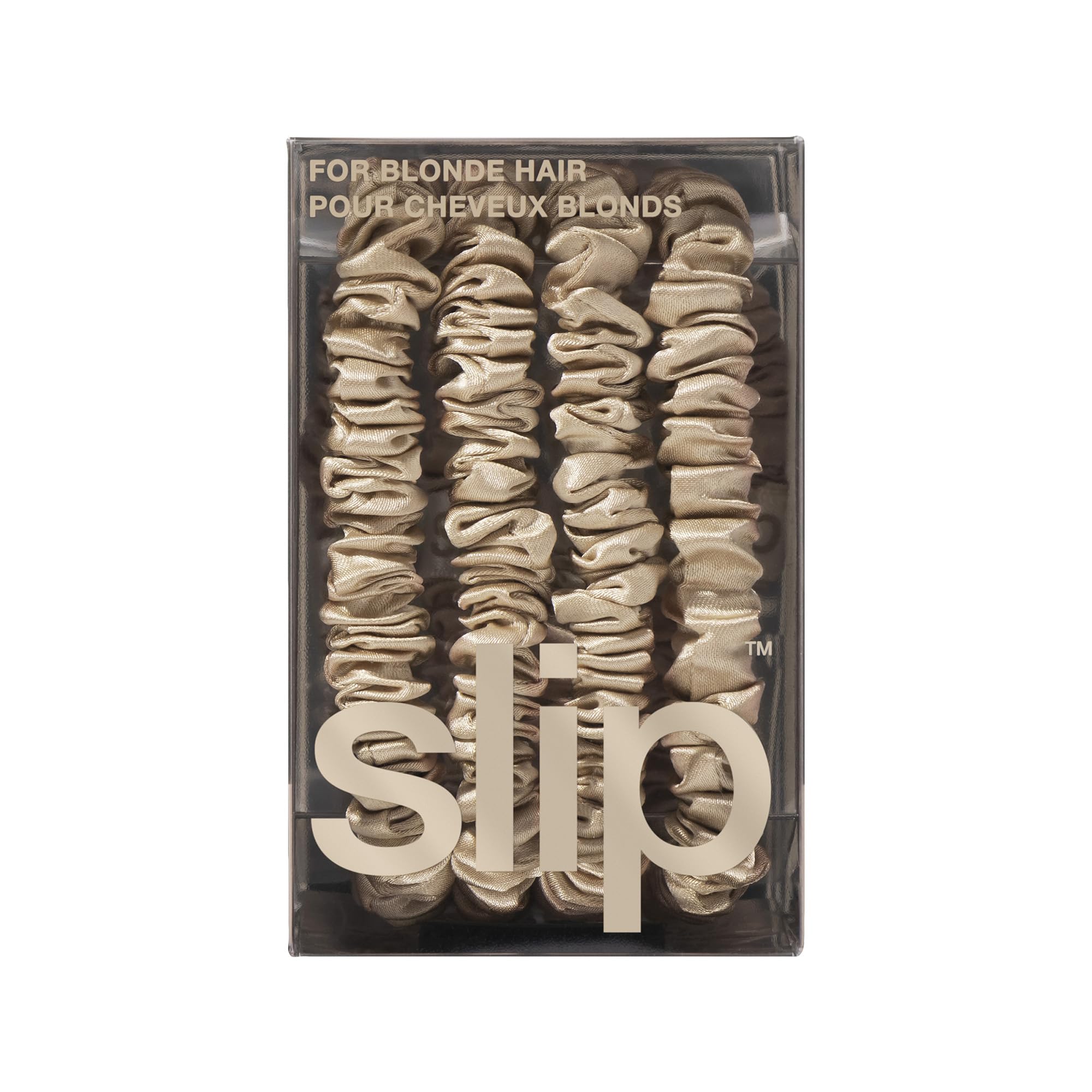 Product label and tag on SLIP scrunchie, material and care information visible