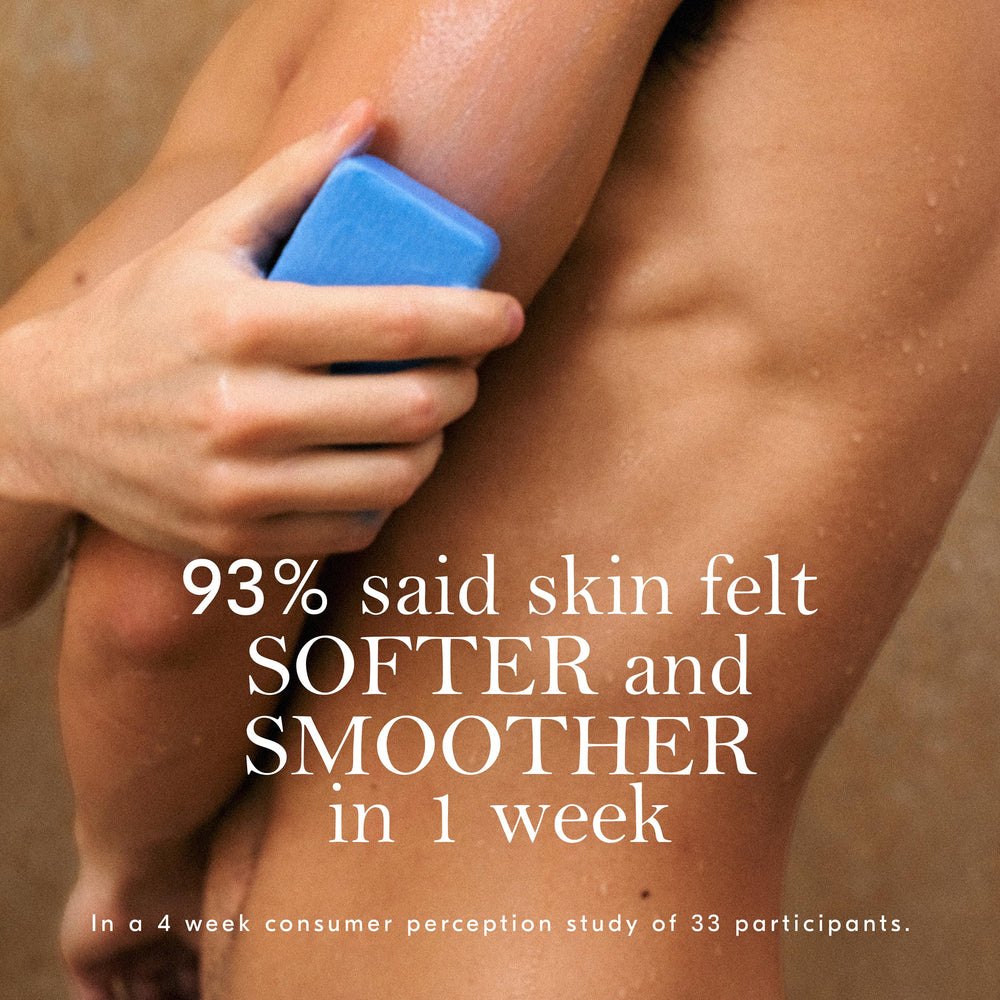 Soft Services Buffing Bar in-hand lathering on wet skin demonstrating control