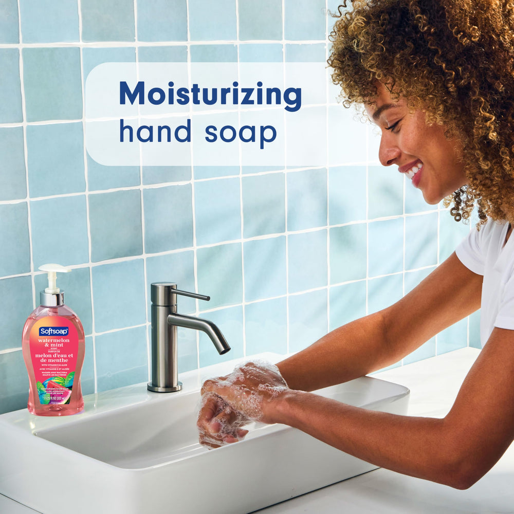 Softsoap in use at a kitchen sink demonstrating clean, refreshed hands