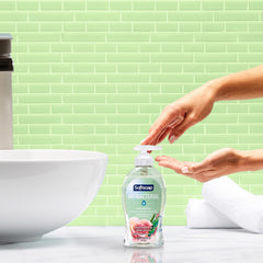 Brand Softsoap pump closeup delivering controlled soap for cleaner hands