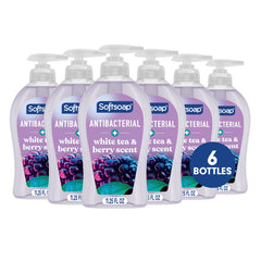 Softsoap bottle front packaging showing White Tea & Berry scent benefits
