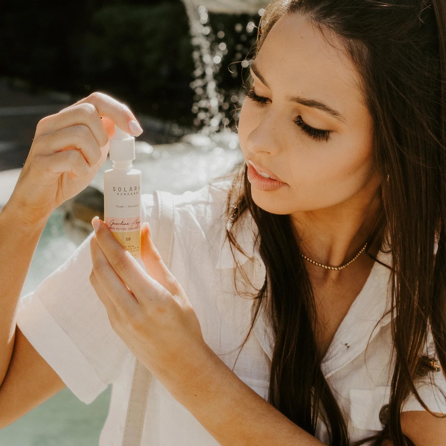 Solara Suncare applied on hand showing quick absorption and non-greasy feel