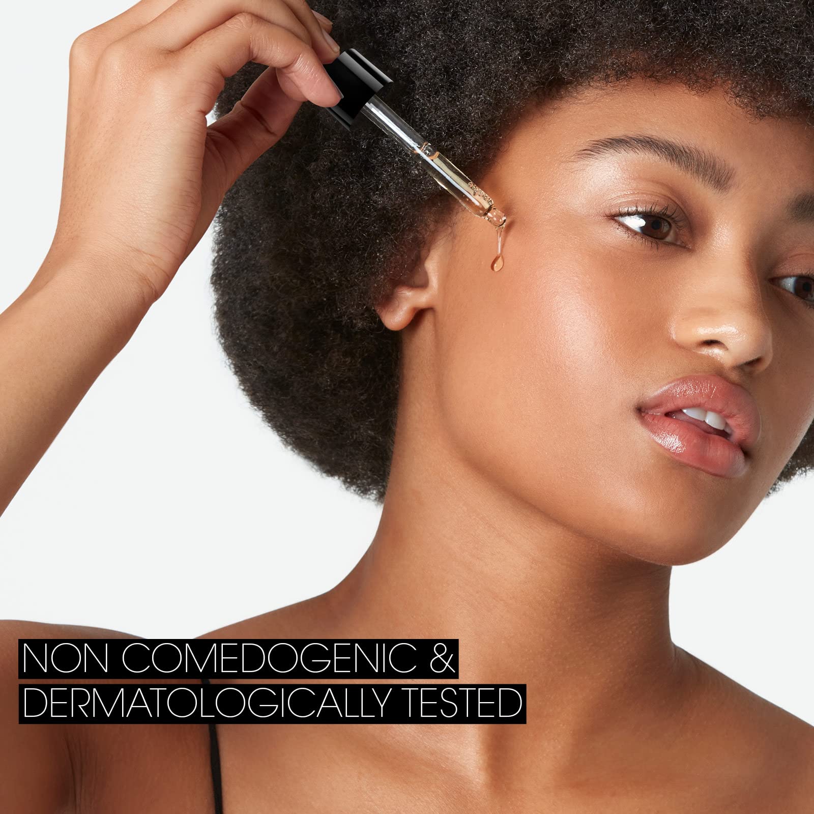 St.Tropez label close-up highlighting active ingredients for skin-nourishing benefit