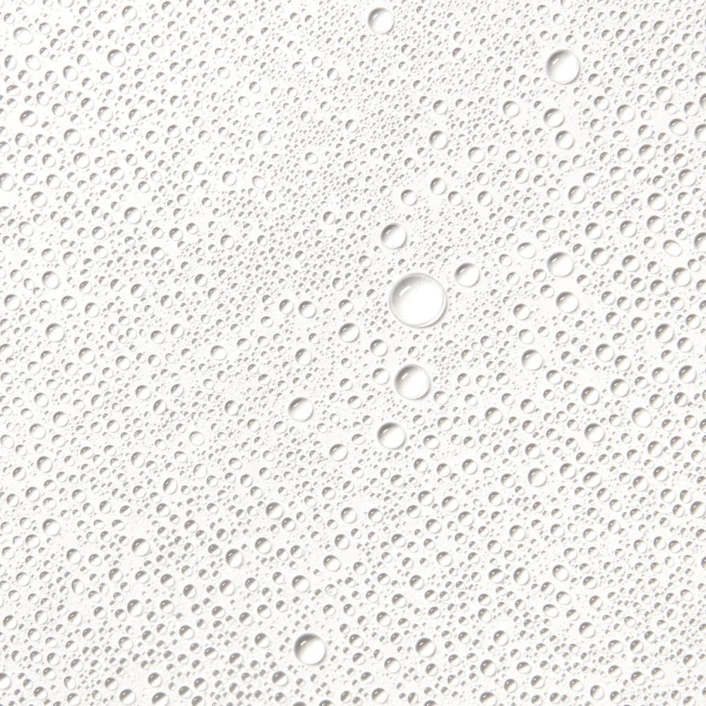 St.Tropez applicator mitt with bottles showing kit scale and simple, even application