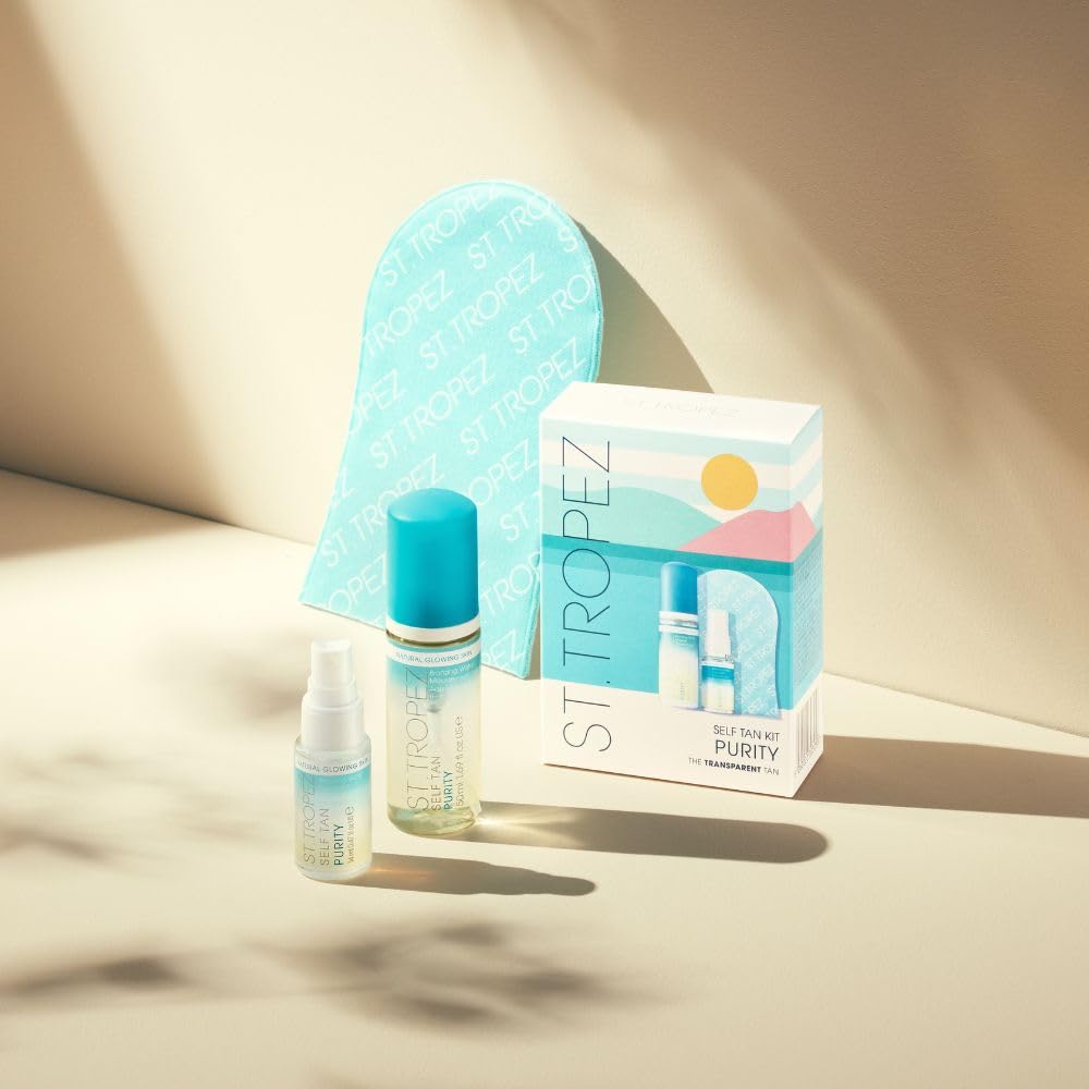 St.Tropez Purity kit in beach bag suggesting travel convenience and on-the-go bronzing