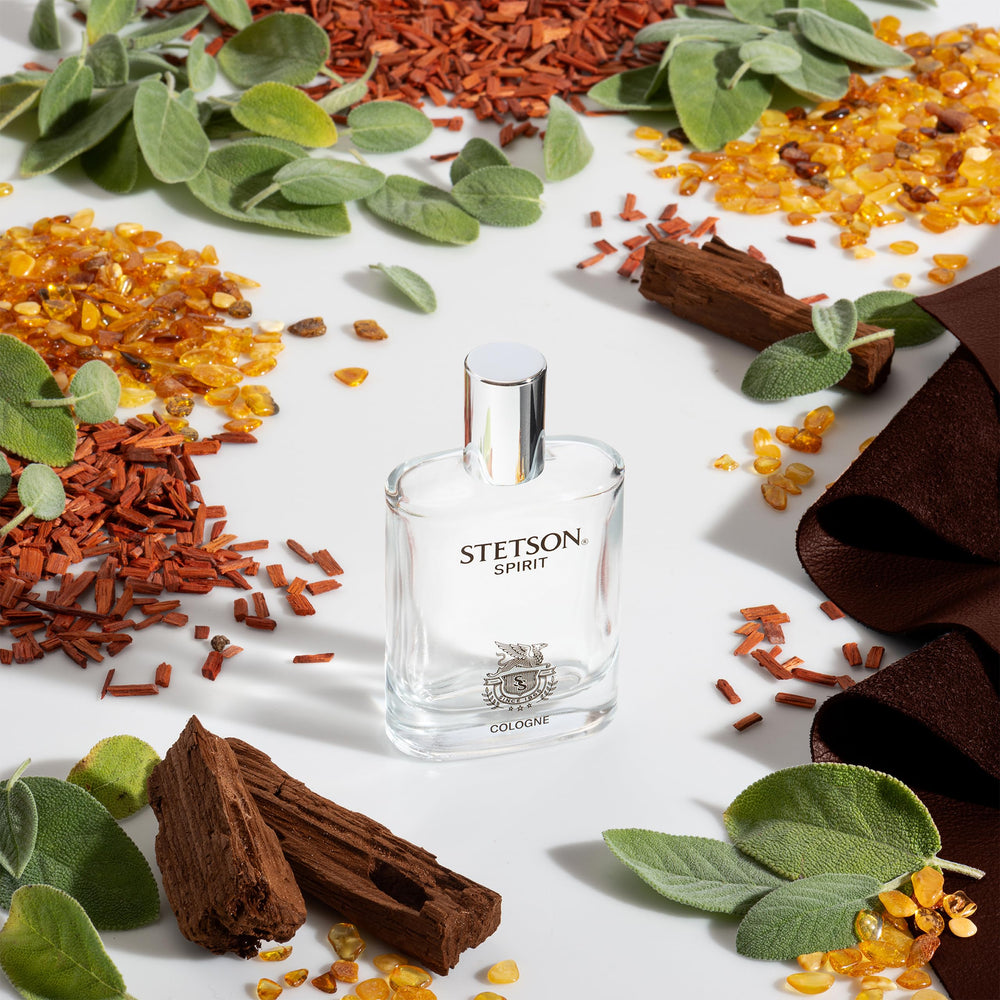 Stetson Legend 1.5 mL vial beside Spirit bottle for travel convenience