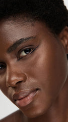 stila model applying winged liner showing long-wear precision benefit