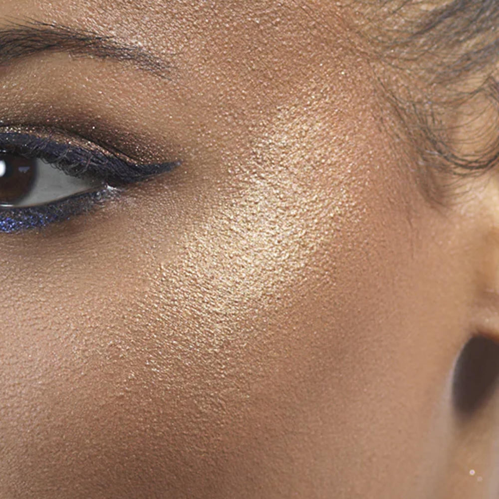 stila product held in hand to show compact size and travel-friendly convenience