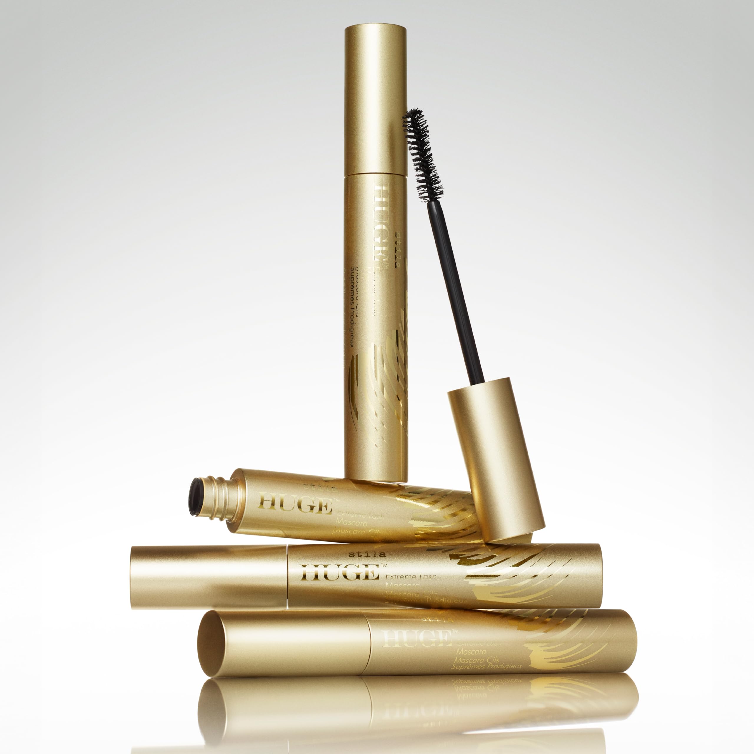 stila HUGE mascara beside pencil showing true size and travel-friendly benefit