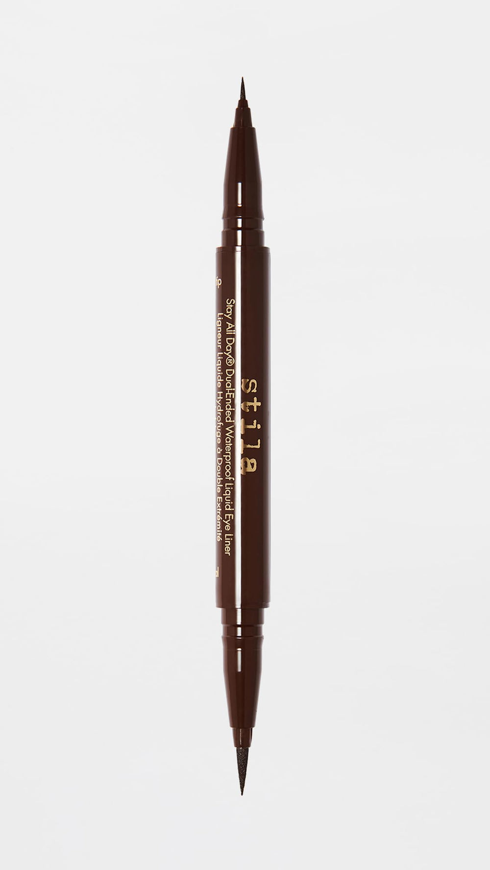 stila packaging beside common items to show compact size and travel ease