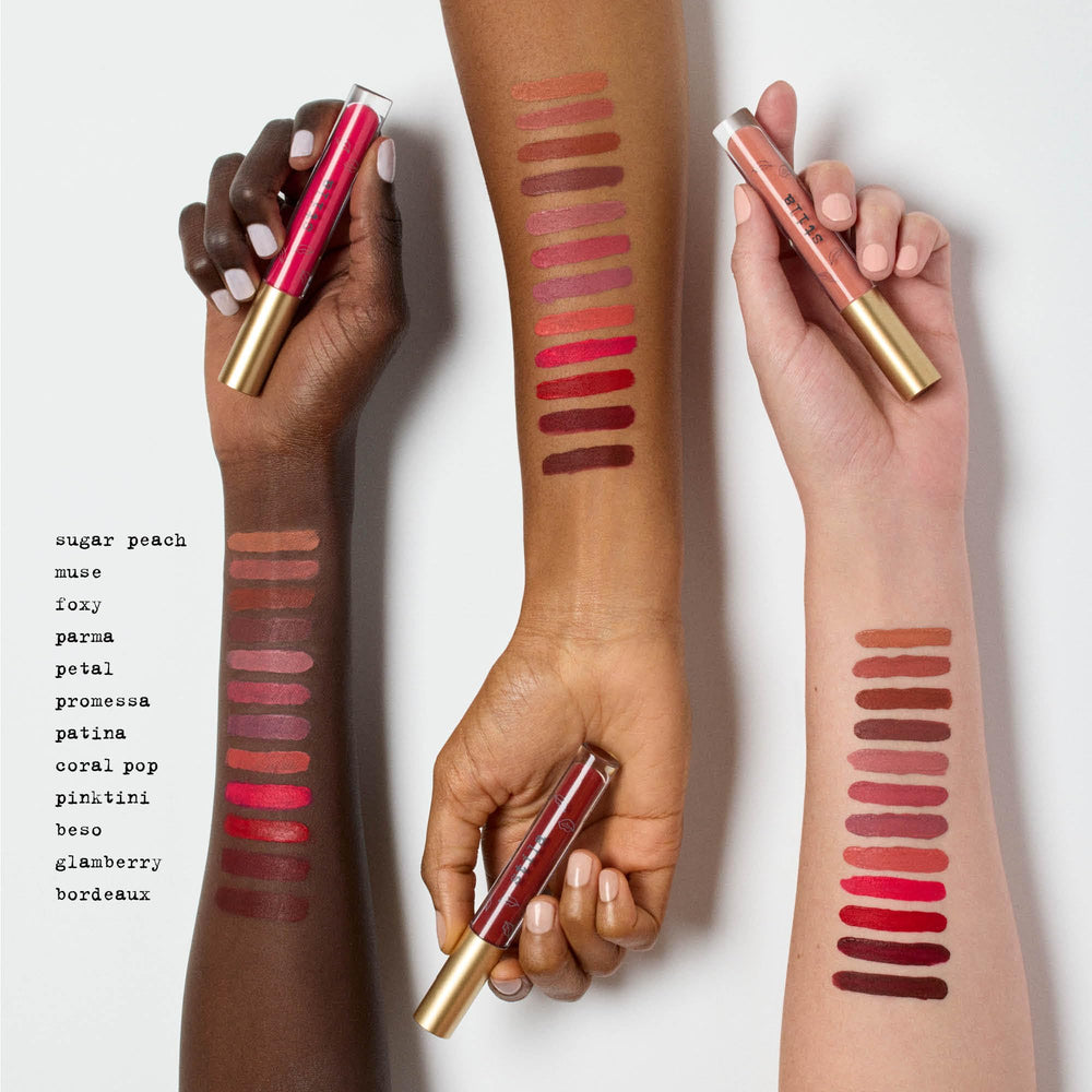 stila Patina swatch on forearm showing rich, matte pigmentation and even payoff