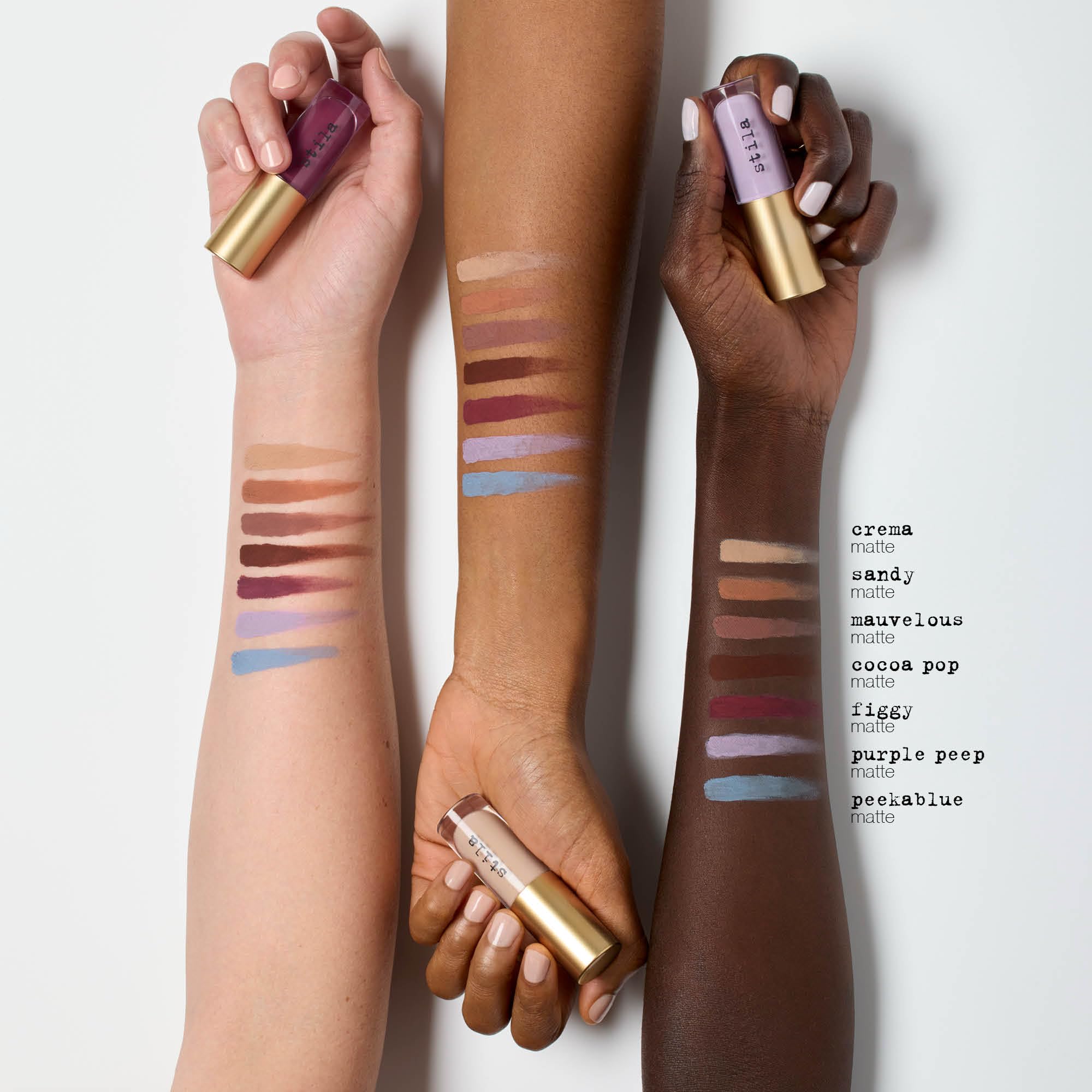 stila tube next to coin for scale to demonstrate compact, travel-friendly size