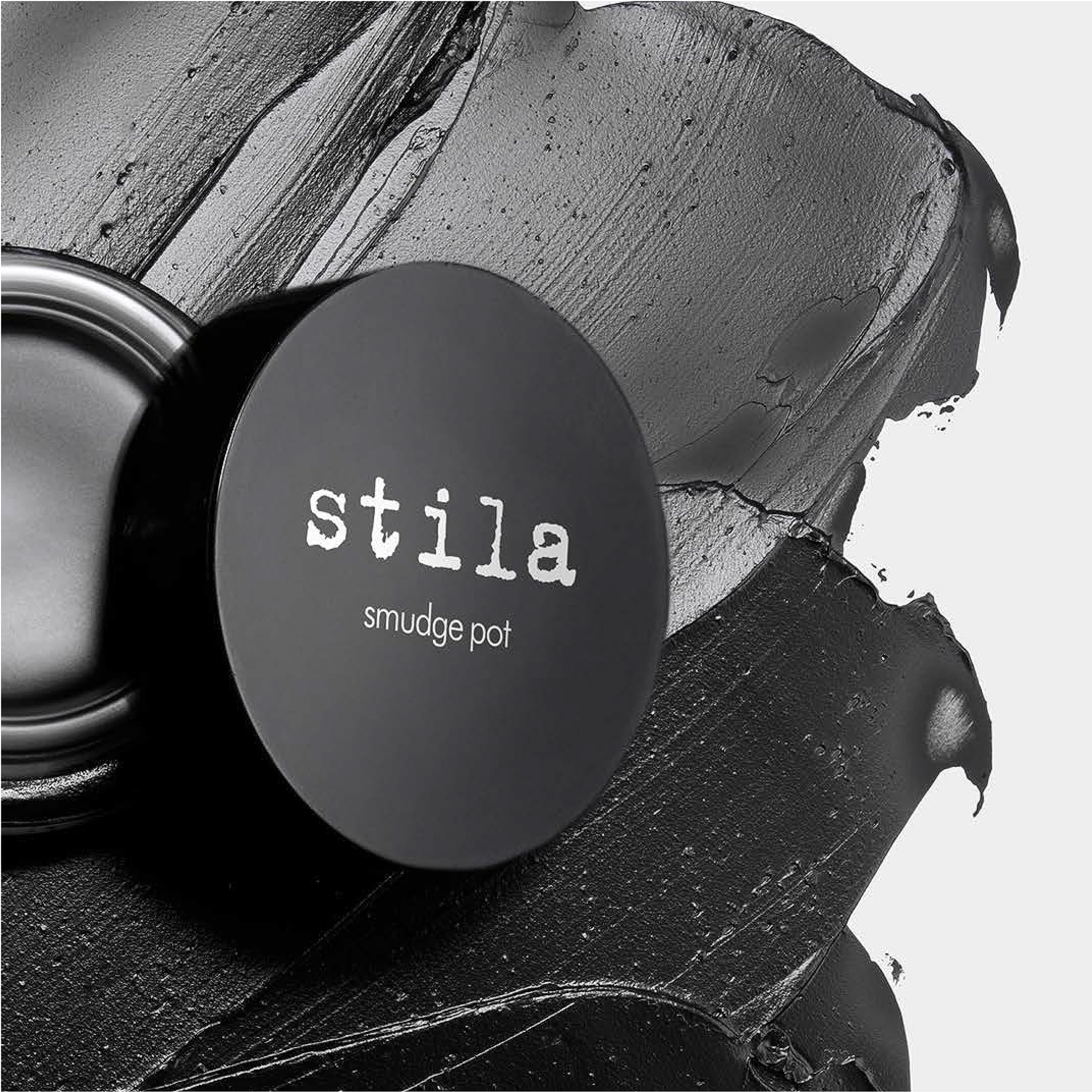 stila Smudge Pot beside brushes and tools showing travel-friendly compact benefit