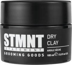 STMNT dry clay tin front view showing compact packaging and matte finish