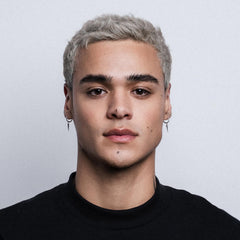 STMNT styled messy hair showcasing semi-matte texture and strong control