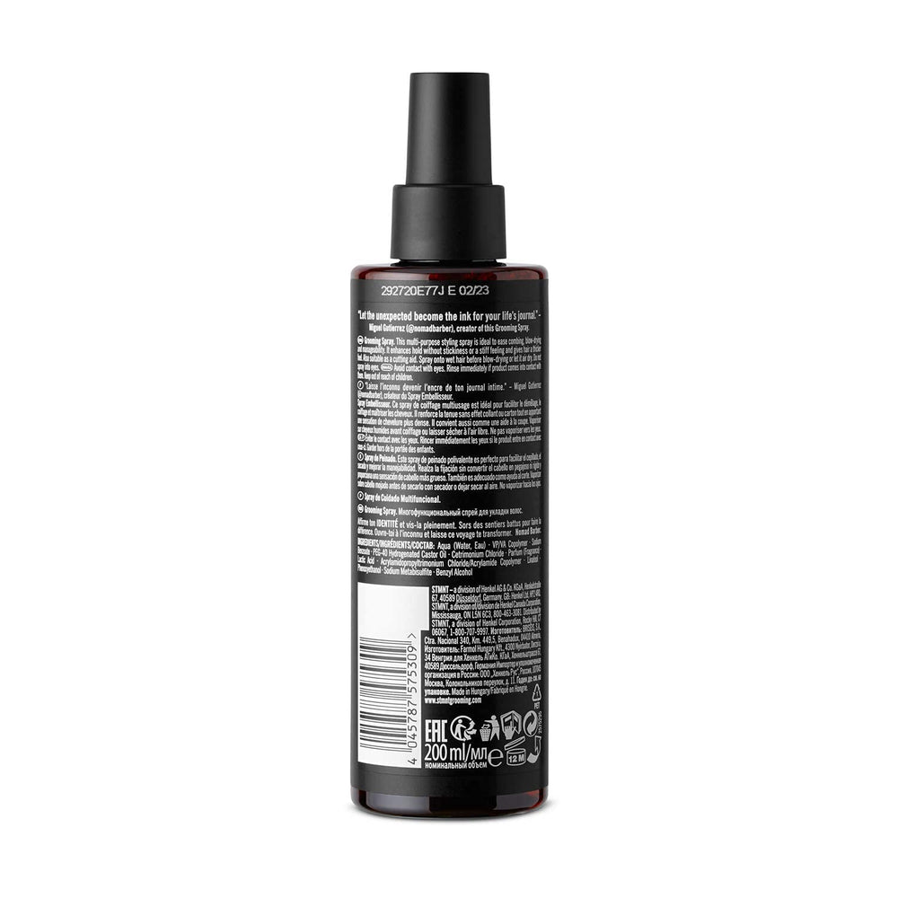 STMNT grooming spray in hand application over damp hair illustrating easy control and faster styling