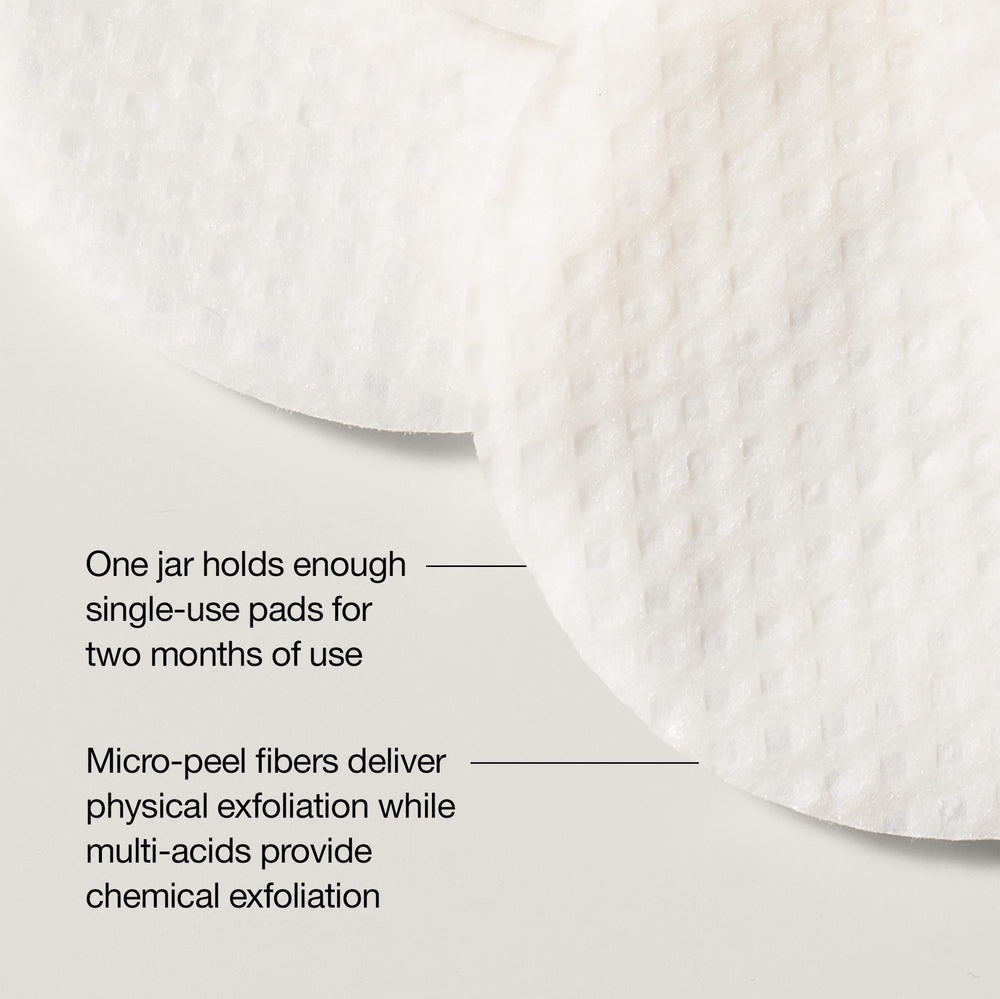 Demonstration of applying a StriVectin pad across the cheek for clarified skin texture