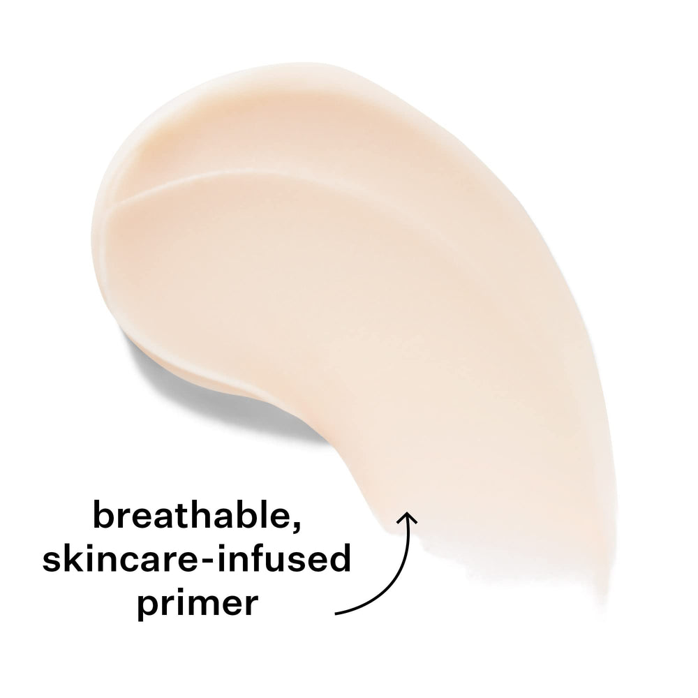 StriVectin primer tucked into a makeup bag illustrating travel-friendly size and daily convenience