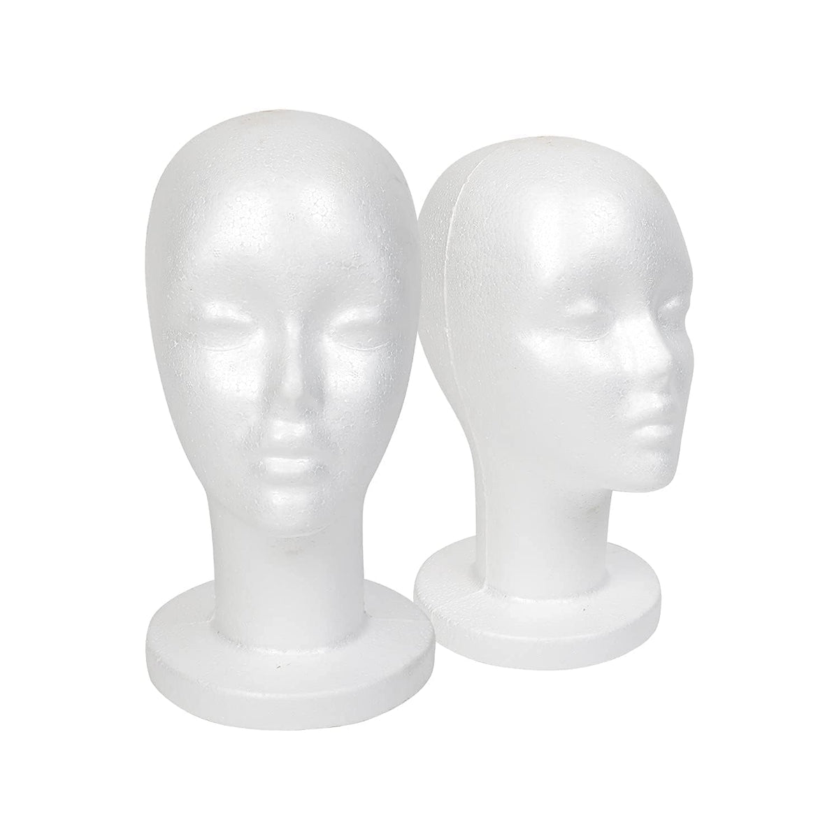 STUDIO LIMITED front view of two mannequin heads showing clean white finish and balance