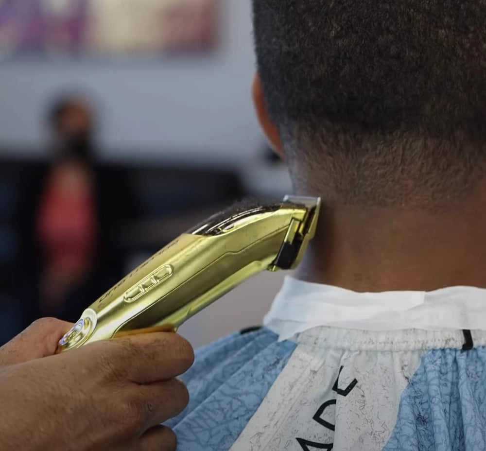 Stylecraft gold titanium faper on barber station showing professional-grade durability and finish
