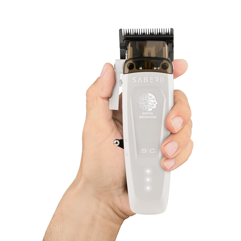 STYLECRAFT Saber 2 held in hand during cutting illustrating ergonomic grip and control