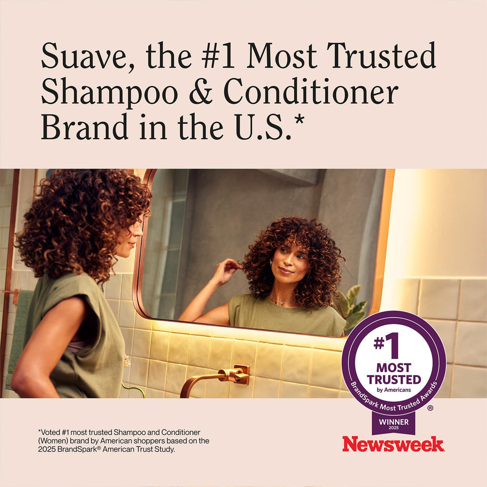 Suave conditioner with rosemary sprigs and mint leaves showing natural scent notes